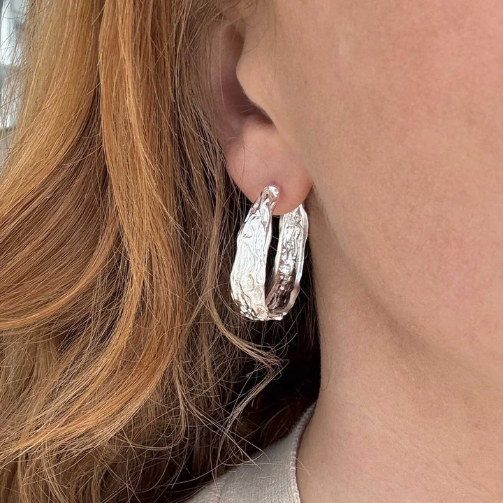 Skap et iøynefallende uttrykk med statement-ørepynt